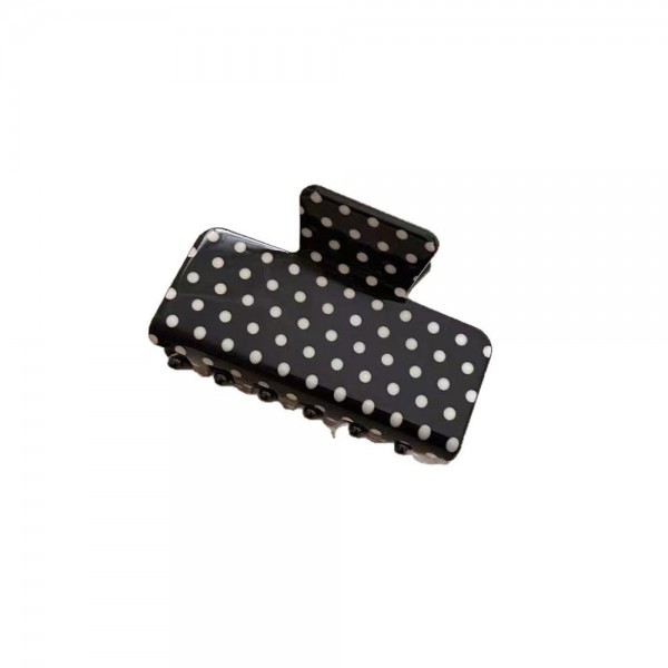 Polka Dot Rectangle Claw Clip with a glossy finish, a sturdy spring hinge, and grippy interlocking teeth that hold medium to thick hair securely. The square silhouette is a modern take on the classic claw and works for French twists, low buns, and quick half up styles. Wear one solo or mix several shades for a playful stack. A trendy, affordable hair accessory that sells in multiples and refreshes any countertop display.