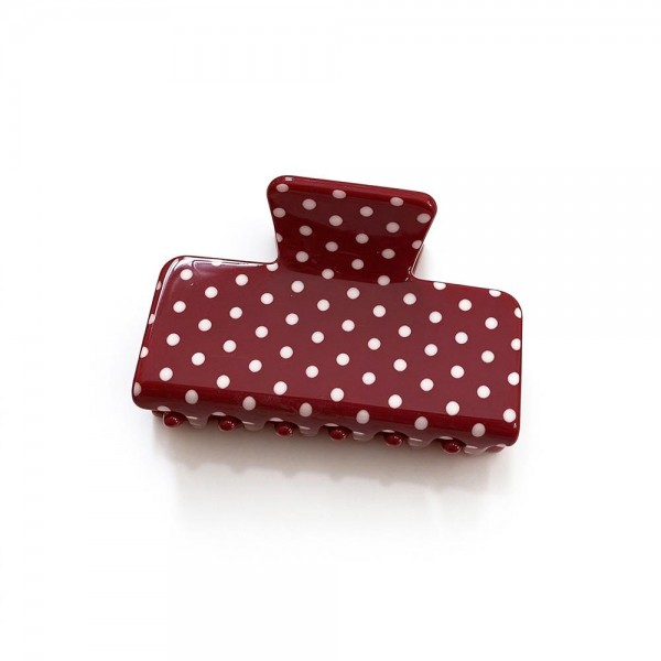 Polka Dot Rectangle Claw Clip with a glossy finish, a sturdy spring hinge, and grippy interlocking teeth that hold medium to thick hair securely. The square silhouette is a modern take on the classic claw and works for French twists, low buns, and quick half up styles. Wear one solo or mix several shades for a playful stack. A trendy, affordable hair accessory that sells in multiples and refreshes any countertop display.