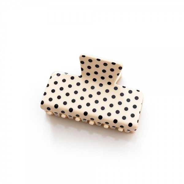 Polka Dot Rectangle Claw Clip with a glossy finish, a sturdy spring hinge, and grippy interlocking teeth that hold medium to thick hair securely. The square silhouette is a modern take on the classic claw and works for French twists, low buns, and quick half up styles. Wear one solo or mix several shades for a playful stack. A trendy, affordable hair accessory that sells in multiples and refreshes any countertop display.