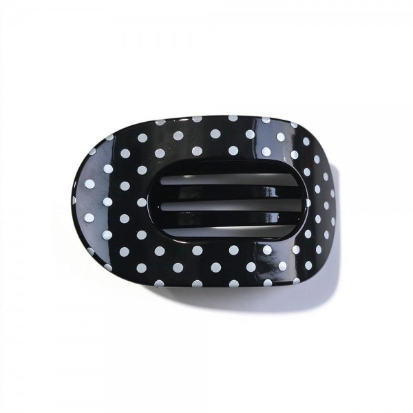 Polka Dot Flat Claw Clip with a glossy finish, an oval open center, and strong interlocking teeth. The low profile shape lies flat against the head, so it stays comfortable when leaning back in the car, on the couch, or at a desk. Great for twists, half up looks, and quick everyday updos. A must have hair accessory at an easy price that customers grab in multiples.