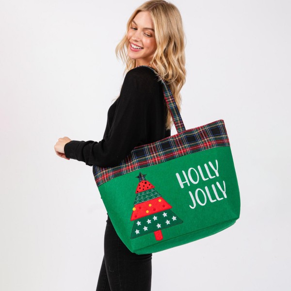 Felt Embroidered 'Holly Jolly' & Christmas Tree Tote Bag With Plaid Detail 

- Lined Inside 
- One Open Pocket 
- Approximately 19.5" L X 13.5" T X 6.5" D
- Strap Drop 8.5" L
- 100% Polyester 