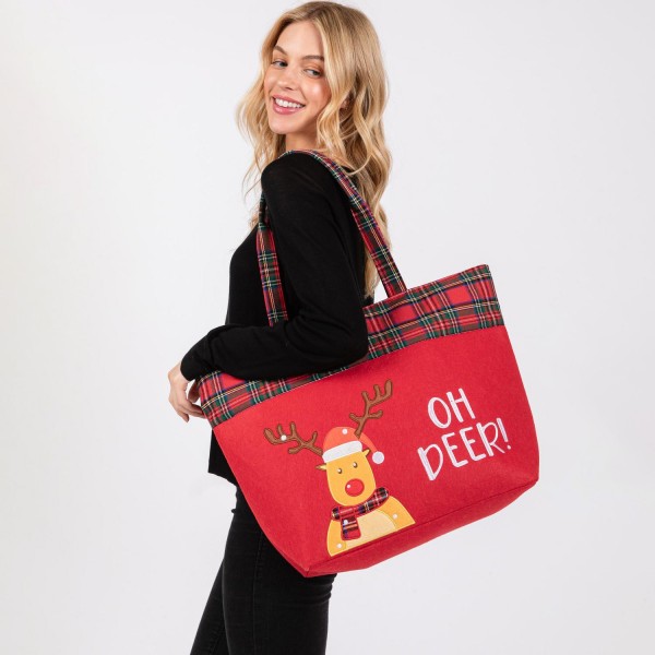 Felt Embroidered 'OH DEER!' & Reindeer Tote Bag With Plaid Detail 

- Lined Inside 
- One Open Pocket 
- Approximately 19.5" L X 13.5" T X 6.5" D
- Strap Drop 8.5" L
- 100% Polyester 