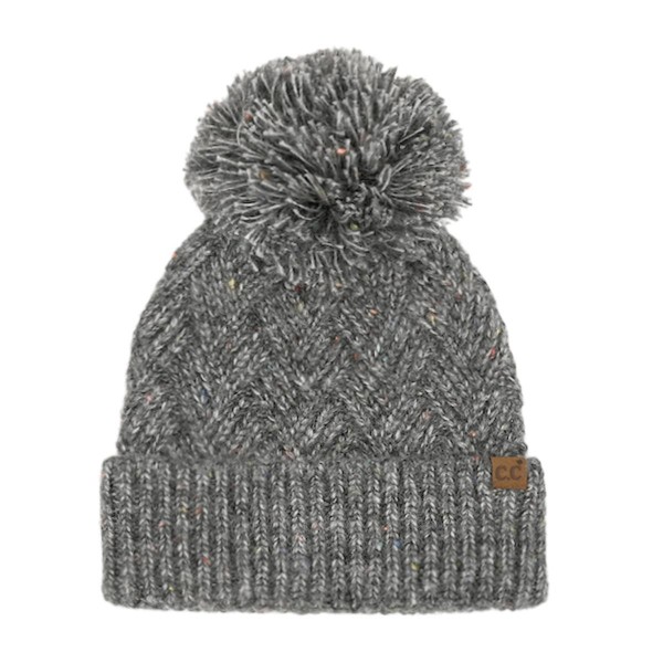 C.C HTE0143
Criss-Cross Pattern Yarn Pom Beanie.

- 66% Recycled Polyester / 24%Acrylic / 5% Nylon / 5% Wool 
- One Size