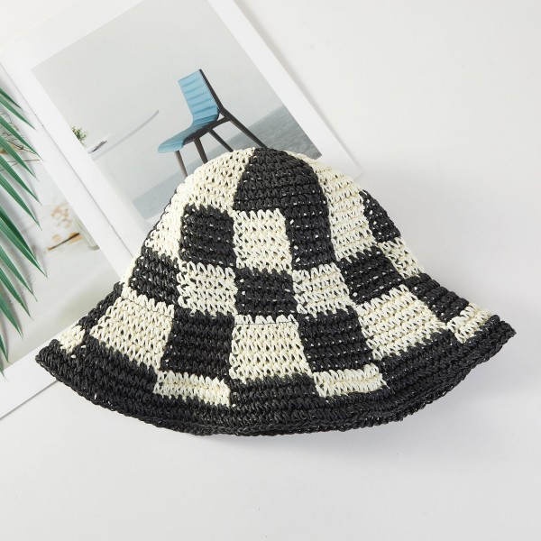 Woven Paper Straw Bucket Hat Featuring Two Tone Plaid 

- One Size Fits Most ( Adjustable Drawstring) 
-Brim Approximately 3" L 
- 100% Paper 
