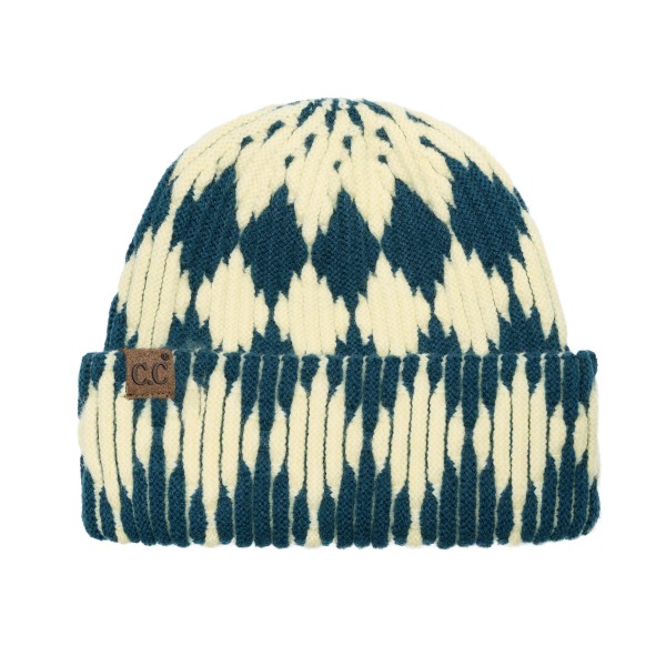 Cuffed knit beanie in a two tone diamond pattern with a deep fold over brim that sits low across the forehead and covers the ears. The chunky rib knit has enough stretch for most head sizes without losing its shape after a wash. A patterned take on the cuffed beanie that stands out beside the solids already on the rack. Knit beanies are the highest turning cold weather accessory most shops carry.