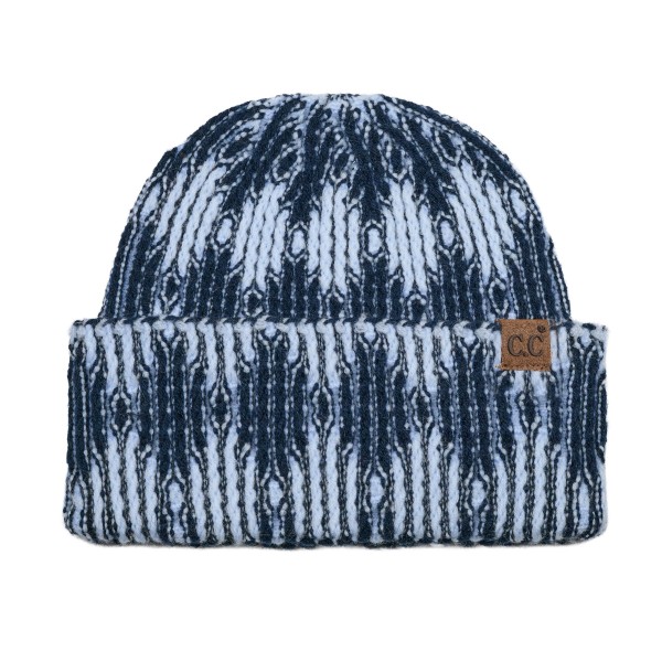 Cuffed knit beanie in a two tone diamond pattern with a deep fold over brim that sits low across the forehead and covers the ears. The chunky rib knit has enough stretch for most head sizes without losing its shape after a wash. A patterned take on the cuffed beanie that stands out beside the solids already on the rack. Knit beanies are the highest turning cold weather accessory most shops carry.