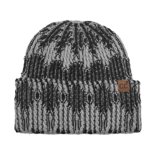 Cuffed knit beanie in a two tone diamond pattern with a deep fold over brim that sits low across the forehead and covers the ears. The chunky rib knit has enough stretch for most head sizes without losing its shape after a wash. A patterned take on the cuffed beanie that stands out beside the solids already on the rack. Knit beanies are the highest turning cold weather accessory most shops carry.
