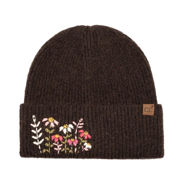 Bring a touch of cottage charm to cold weather style with this floral embroidered knit beanie, featuring a sweet cluster of stitched wildflowers on a fold over cuff and a small leather look patch for a polished finish. The soft heathered knit offers a snug, stretchy fit that keeps you warm without the bulk. An easy everyday layer for fall and winter that pairs perfectly with sweaters and puffers, and a thoughtful gift for boutiques and gift shops.