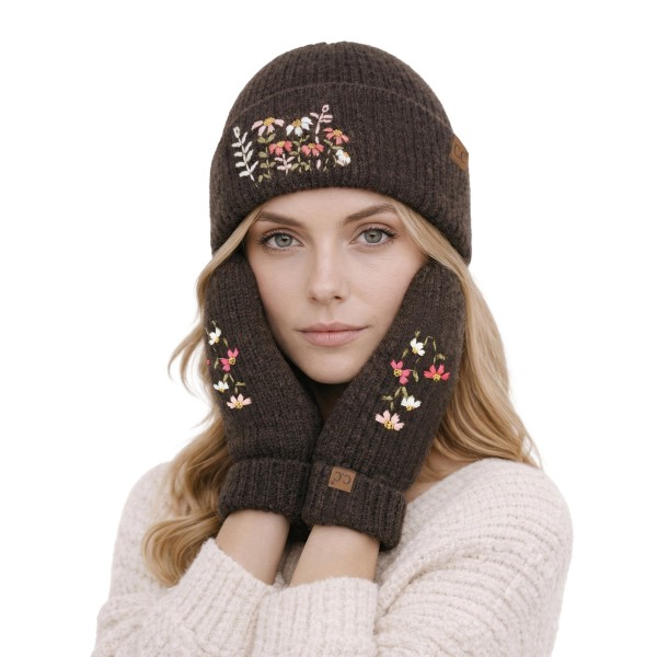 Bring a touch of cottage charm to cold weather style with this floral embroidered knit beanie, featuring a sweet cluster of stitched wildflowers on a fold over cuff and a small leather look patch for a polished finish. The soft heathered knit offers a snug, stretchy fit that keeps you warm without the bulk. An easy everyday layer for fall and winter that pairs perfectly with sweaters and puffers, and a thoughtful gift for boutiques and gift shops.