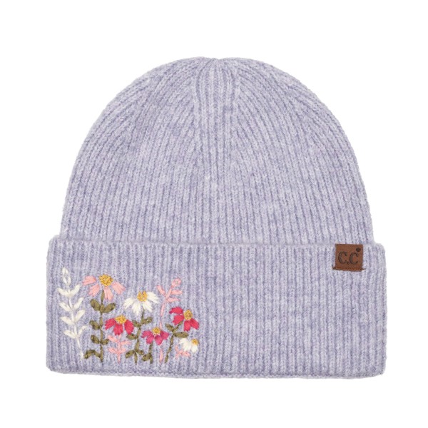 Bring a touch of cottage charm to cold weather style with this floral embroidered knit beanie, featuring a sweet cluster of stitched wildflowers on a fold over cuff and a small leather look patch for a polished finish. The soft heathered knit offers a snug, stretchy fit that keeps you warm without the bulk. An easy everyday layer for fall and winter that pairs perfectly with sweaters and puffers, and a thoughtful gift for boutiques and gift shops.
