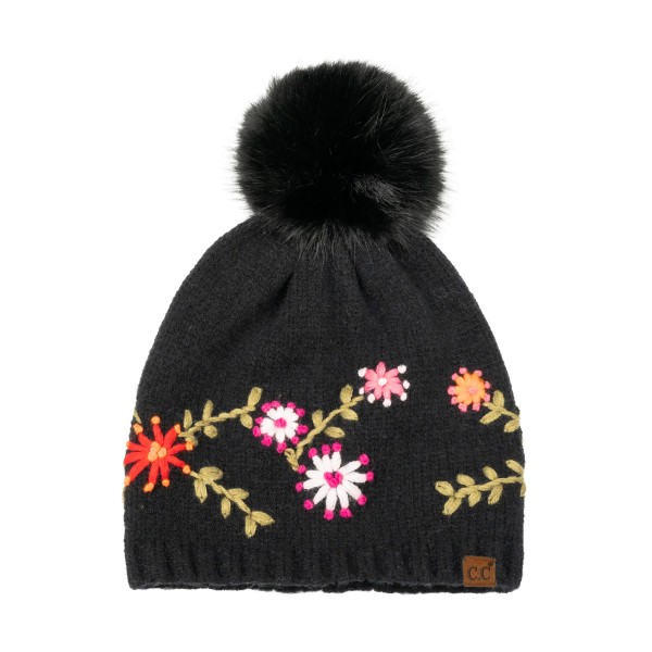 Floral Embroidered Pom Beanie with a stitched vine of tiny blossoms and leaves circling the crown, topped with a fluffy faux fur pom. The soft, stretchy knit keeps a smooth, fitted shape and finishes with a ribbed band that sits comfortably over the ears. A sweet, cottage inspired look for holiday markets, school drop offs, and cozy weekend outings. Embroidered beanies pop on the hat wall and are an easy pick for gift shoppers all season long.