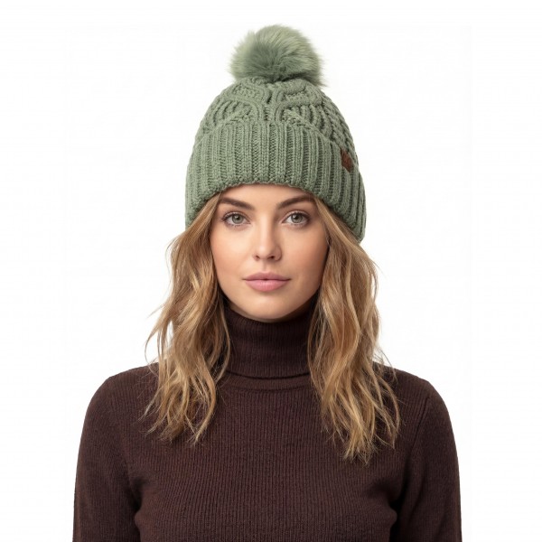 Cable Knit Pom Beanie with a bold braided cable running up the front and a tall ribbed cuff that folds over for a double layer of warmth. A plump faux fur pom finishes the top, and a small faux leather patch adds a polished touch at the cuff. Made for chilly game days, holiday shopping, and weekend getaways. Cable knit pom beanies are a proven winter best seller and an easy reorder for any boutique hat wall.