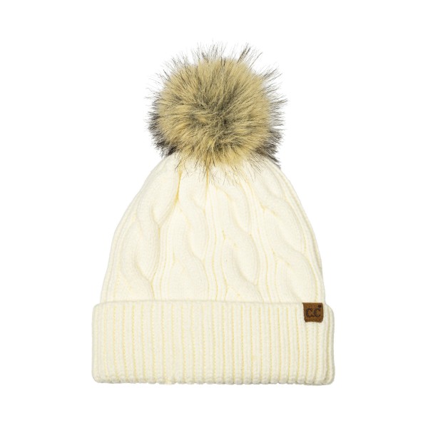 Cable Knit Faux Fur Pom Beanie with a classic braided cable crown, a wide ribbed cuff, and a plush natural tipped faux fur pom. The soft, stretchy knit fits most adults and folds up for extra warmth over the ears. Perfect for ski lodges, holiday markets, cold football nights, and everyday winter errands. Timeless cable pom beanies are a year after year best seller and an easy stocking stuffer for teens and moms.