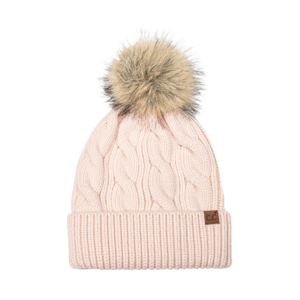 Cable Knit Faux Fur Pom Beanie with a classic braided cable crown, a wide ribbed cuff, and a plush natural tipped faux fur pom. The soft, stretchy knit fits most adults and folds up for extra warmth over the ears. Perfect for ski lodges, holiday markets, cold football nights, and everyday winter errands. Timeless cable pom beanies are a year after year best seller and an easy stocking stuffer for teens and moms.