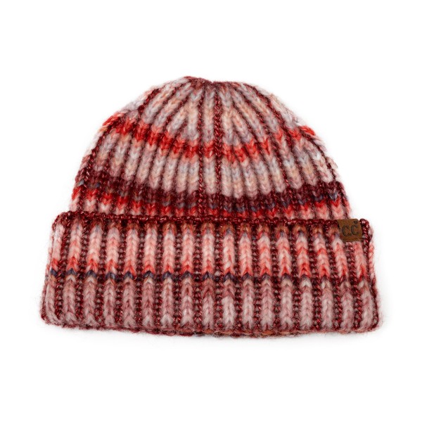Space Dye Knit Cuffed Beanie in a chunky rib with marled, multi tone yarn that gives every stitch a soft heathered blend. The thick fold over cuff adds an extra layer of warmth over the ears, and a small faux leather patch finishes the front. A cozy, laid back pick for campus, coffee runs, and weekend hikes. Multi tone knits pair with almost any coat, which keeps this style turning on the hat wall all winter.