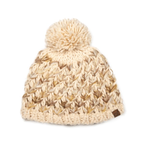 Popcorn Stitch Pom Beanie knit in a textured bubble pattern with a ribbed cuff and a chunky yarn pom on top. The plush, stretchy knit keeps ears warm and has a cozy handmade feel that stands out on the display wall. Great for snow days, ski trips, holiday markets, and weekend errands. Textured knit pom hats are a steady winter seller and an easy gift for teens, moms, and teachers.