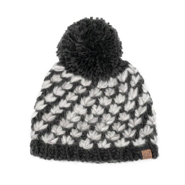 Popcorn Stitch Pom Beanie knit in a textured bubble pattern with a ribbed cuff and a chunky yarn pom on top. The plush, stretchy knit keeps ears warm and has a cozy handmade feel that stands out on the display wall. Great for snow days, ski trips, holiday markets, and weekend errands. Textured knit pom hats are a steady winter seller and an easy gift for teens, moms, and teachers.
