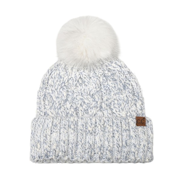Marled Cable Knit Pom Beanie with a chunky twisted cable texture, a ribbed fold over cuff, and a fluffy faux fur pom on top. The soft heathered yarn has a cozy, handknit look that pairs with puffers, parkas, and wool coats. Perfect for ski trips, holiday markets, school pickups, and everyday winter wear. Pom beanies are a top cold weather seller and an easy stocking stuffer customers buy in multiples.