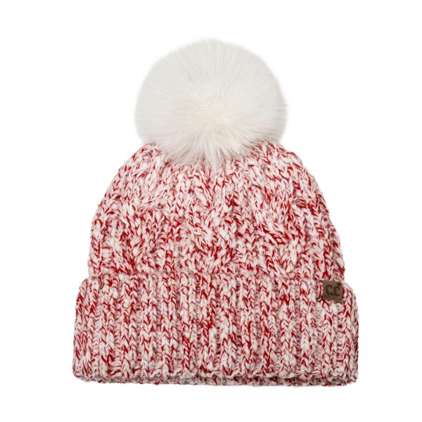 Marled Cable Knit Pom Beanie with a chunky twisted cable texture, a ribbed fold over cuff, and a fluffy faux fur pom on top. The soft heathered yarn has a cozy, handknit look that pairs with puffers, parkas, and wool coats. Perfect for ski trips, holiday markets, school pickups, and everyday winter wear. Pom beanies are a top cold weather seller and an easy stocking stuffer customers buy in multiples.