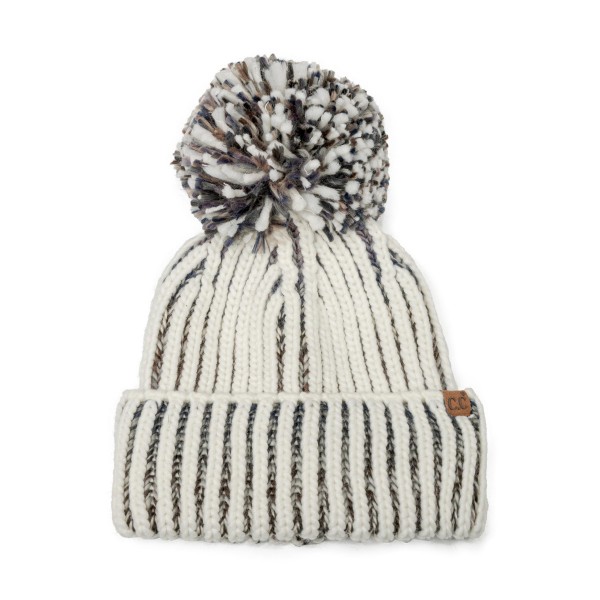 Two Tone Ribbed Pom Beanie knit in a chunky vertical rib with a marled contrast yarn that adds depth to every column. An oversized multi tone yarn pom crowns the top, and the deep fold over cuff keeps ears toasty on the coldest days. Great for ski trips, sledding, and bonfire nights. Bold texture and a big pom give this beanie standout shelf appeal, making it an easy add on for any winter accessory display.