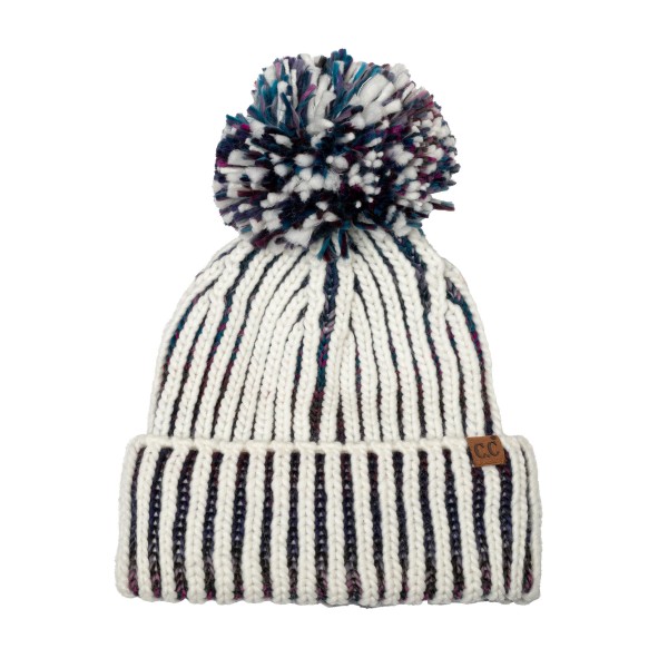 Two Tone Ribbed Pom Beanie knit in a chunky vertical rib with a marled contrast yarn that adds depth to every column. An oversized multi tone yarn pom crowns the top, and the deep fold over cuff keeps ears toasty on the coldest days. Great for ski trips, sledding, and bonfire nights. Bold texture and a big pom give this beanie standout shelf appeal, making it an easy add on for any winter accessory display.