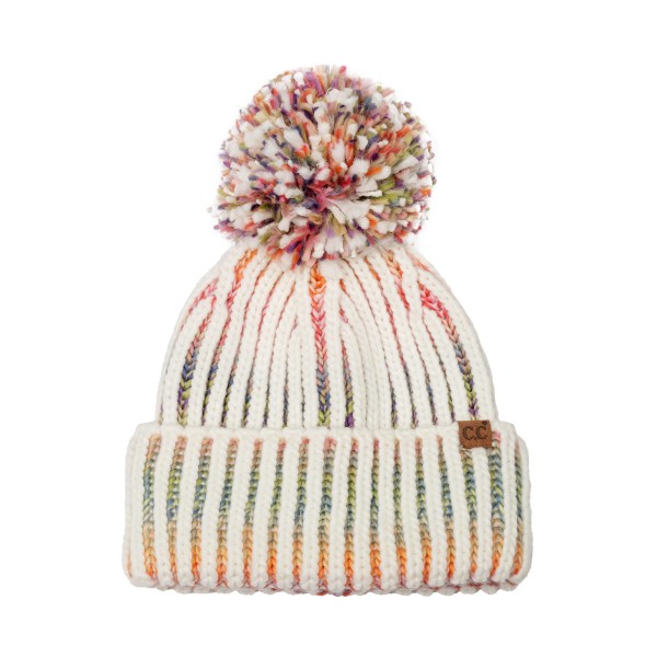 Two Tone Ribbed Pom Beanie knit in a chunky vertical rib with a marled contrast yarn that adds depth to every column. An oversized multi tone yarn pom crowns the top, and the deep fold over cuff keeps ears toasty on the coldest days. Great for ski trips, sledding, and bonfire nights. Bold texture and a big pom give this beanie standout shelf appeal, making it an easy add on for any winter accessory display.
