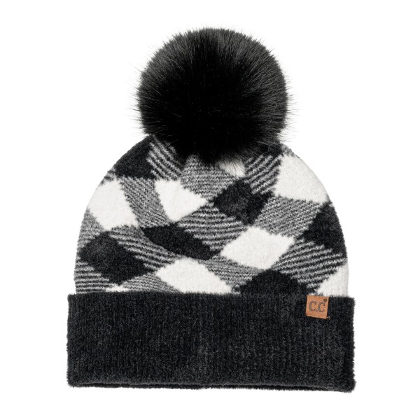 Buffalo Check Pom Beanie with a bold plaid knit crown, a solid ribbed fold over cuff, and an oversized faux fur pom on top. The soft stretch knit keeps ears warm and fits most adults comfortably. Made for tailgates, holiday markets, cabin weekends, and snowy school pickups. Plaid pom beanies are a classic winter seller and a go to stocking stuffer for teens, moms, and friends.