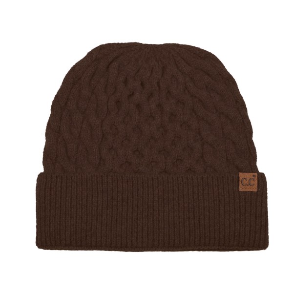 Cable Knit Cuffed Beanie with an allover braided cable pattern and a thick fold over cuff finished with a small faux leather patch. The soft stretch knit hugs the head without squeezing, and the double layer cuff adds extra warmth over the ears. A classic cold weather staple for game days, school runs, ski trips, and holiday gifting. Timeless cable knit beanies are a dependable reorder every fall and winter, so this one earns a permanent spot on the hat wall.