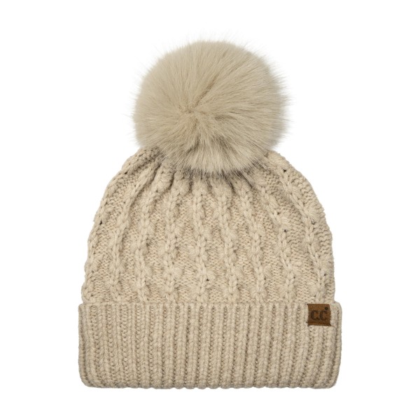 Lattice Cable Knit Pom Beanie with an allover diamond cable texture in a soft heathered yarn, topped with a plush faux fur pom. The ribbed band folds up for a snug double layer over the ears, and a small faux leather patch adds a finished look. A cozy favorite for holiday shopping, tailgates, and snowy weekend walks. Textured pom beanies are a top seller every winter and make an easy, giftable add on at the register.