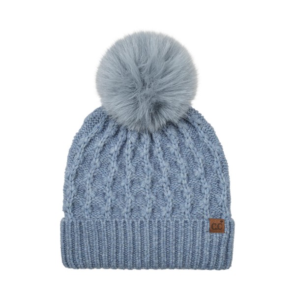 Lattice Cable Knit Pom Beanie with an allover diamond cable texture in a soft heathered yarn, topped with a plush faux fur pom. The ribbed band folds up for a snug double layer over the ears, and a small faux leather patch adds a finished look. A cozy favorite for holiday shopping, tailgates, and snowy weekend walks. Textured pom beanies are a top seller every winter and make an easy, giftable add on at the register.