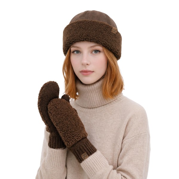 Sherpa Cuff Fisherman Beanie with a smooth suede look crown and a thick, fluffy sherpa band that hugs the head for extra warmth. The short, cropped silhouette sits above the ears for the trending fisherman style that pairs with shackets, puffers, and wool coats. Great for chilly commutes, weekend errands, fall festivals, and ski lodge days. Cozy sherpa hats are a winter must have and an easy gift for teens, moms, and friends.