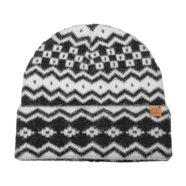 Fair Isle Knit Cuffed Beanie with a bold geometric pattern of zigzags, diamonds, and stripes worked in a soft, brushed yarn. The fold over cuff doubles the warmth over the ears, and a small faux leather patch adds a classic finishing detail. Made for ski lodges, holiday markets, and snowy commutes. Nordic inspired patterns are a seasonal favorite that shoppers grab for themselves and for gifting, so this one turns fast once temperatures drop.