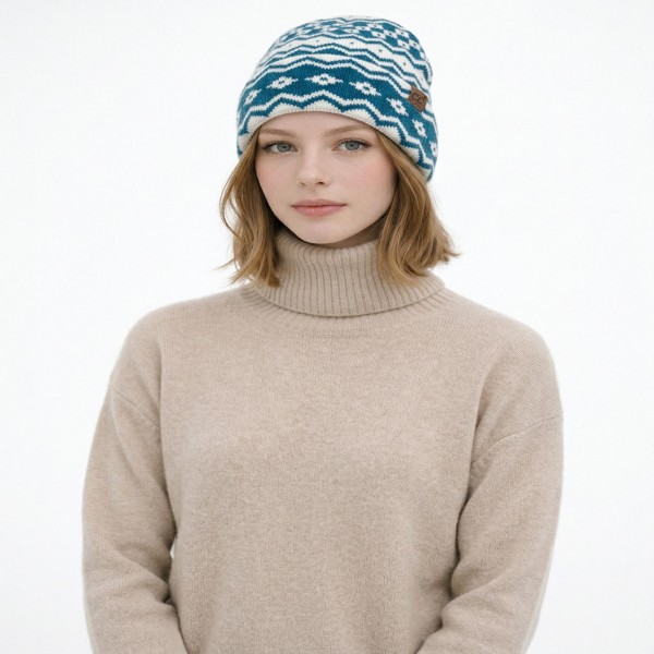 Fair Isle Knit Cuffed Beanie with a bold geometric pattern of zigzags, diamonds, and stripes worked in a soft, brushed yarn. The fold over cuff doubles the warmth over the ears, and a small faux leather patch adds a classic finishing detail. Made for ski lodges, holiday markets, and snowy commutes. Nordic inspired patterns are a seasonal favorite that shoppers grab for themselves and for gifting, so this one turns fast once temperatures drop.