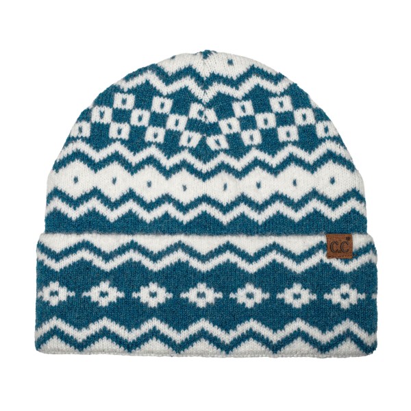 Fair Isle Knit Cuffed Beanie with a bold geometric pattern of zigzags, diamonds, and stripes worked in a soft, brushed yarn. The fold over cuff doubles the warmth over the ears, and a small faux leather patch adds a classic finishing detail. Made for ski lodges, holiday markets, and snowy commutes. Nordic inspired patterns are a seasonal favorite that shoppers grab for themselves and for gifting, so this one turns fast once temperatures drop.