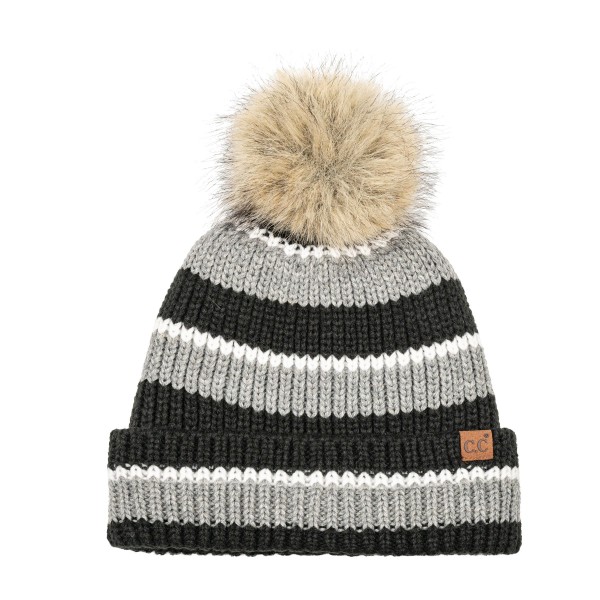 Striped knit pom beanie with a chunky ribbed body, a fold over cuff, and a fluffy faux fur pom on top. The soft, stretchy knit holds its shape and keeps ears covered on cold mornings, game nights, and ski weekends. Bold retro stripes give it a fun, cozy look that works with puffers, flannels, and fleece. A reliable winter bestseller that shoppers grab as a gift or a treat for themselves.