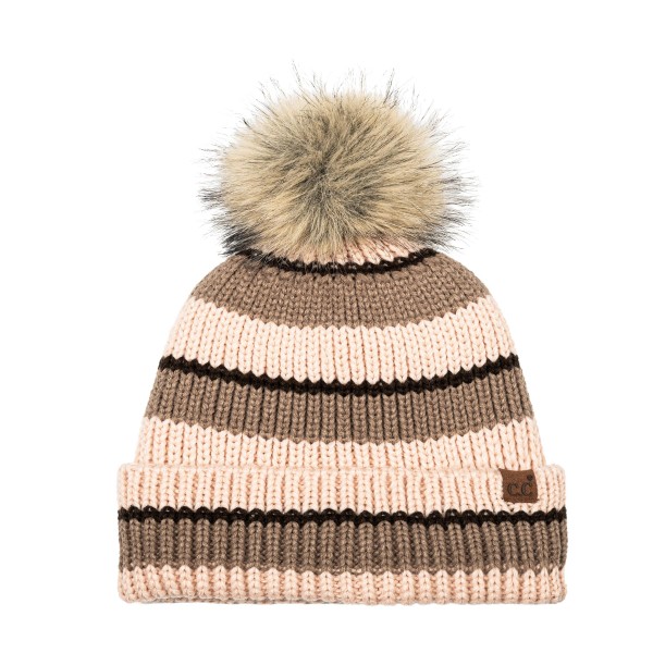 Striped knit pom beanie with a chunky ribbed body, a fold over cuff, and a fluffy faux fur pom on top. The soft, stretchy knit holds its shape and keeps ears covered on cold mornings, game nights, and ski weekends. Bold retro stripes give it a fun, cozy look that works with puffers, flannels, and fleece. A reliable winter bestseller that shoppers grab as a gift or a treat for themselves.