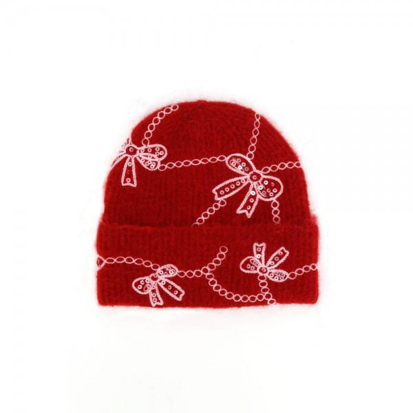 Add a sweet and sparkly finish to cold weather looks with this bow embroidered knit beanie, featuring delicate sequin bows linked by a scalloped chain design across a soft, fuzzy ribbed knit. The fold over cuff offers extra warmth around the ears and a relaxed, slouchy fit that flatters every face. A charming seasonal favorite that pairs beautifully with sweaters and wool coats, perfect for holiday gifting and boutique displays.