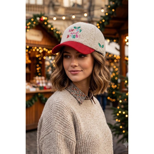 Merry And Bright Embroidered Baseball Cap in a plush boucle knit with a contrast corduroy brim. Multicolor script lettering is stitched across the front with a holly sprig accent for a cheerful holiday message. An adjustable back strap fits most. Word hats sell on the phrase alone, making this a strong seasonal pick for boutiques, gift shops, and holiday markets.