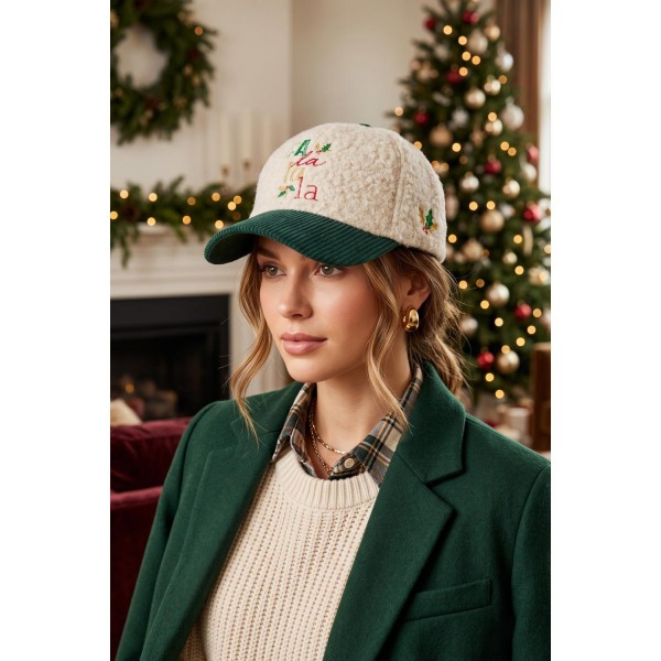 Fa La La Embroidered Baseball Cap with a soft boucle crown and contrast corduroy brim. Playful script lettering and a small holly accent are stitched across the front for a festive carol inspired look. An adjustable back strap fits most. A lighthearted holiday hat that layers with sweaters and puffers, and an easy impulse add on for December displays.