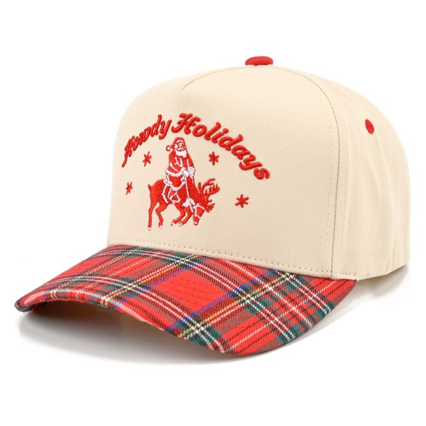 Howdy Holidays Christmas Baseball Cap with a western Santa on horseback embroidered on the front panel and a festive tartan plaid brim. A structured cap with a curved brim that pairs easily with sweaters, flannels, and puffer vests. Perfect for Christmas parties, holiday rodeos, tree farm trips, and cowgirl gift exchanges. Western holiday hats are a fun seasonal best seller that customers grab for themselves and as gifts.