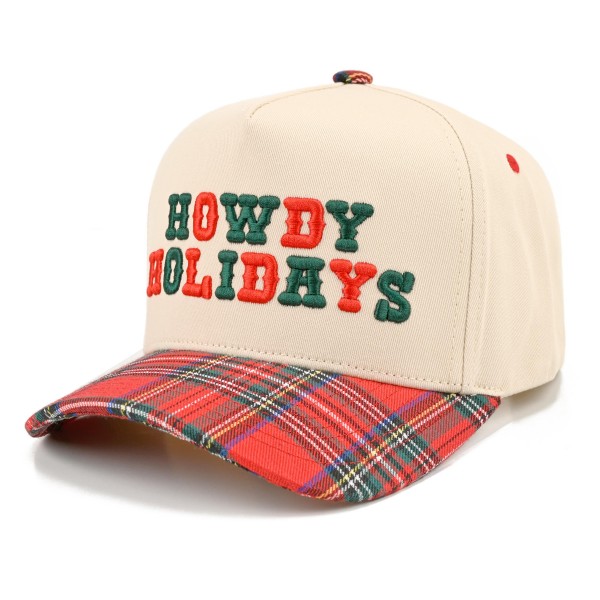 Saddle up for the season with this Howdy Holidays trucker cap, featuring bold embroidered lettering across a structured front panel with breathable mesh in the back. A playful western holiday look that pairs perfectly with cozy sweaters, flannels, and denim. The adjustable snapback closure delivers a comfortable fit for most head sizes, making it an easy gift and a festive seasonal favorite for boutiques and gift shops.