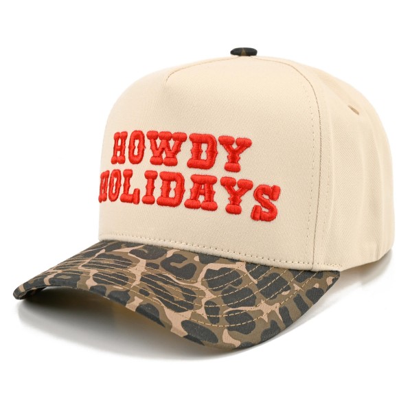 Saddle up for the season with this Howdy Holidays trucker cap, featuring bold embroidered lettering across a structured front panel with breathable mesh in the back. A playful western holiday look that pairs perfectly with cozy sweaters, flannels, and denim. The adjustable snapback closure delivers a comfortable fit for most head sizes, making it an easy gift and a festive seasonal favorite for boutiques and gift shops.