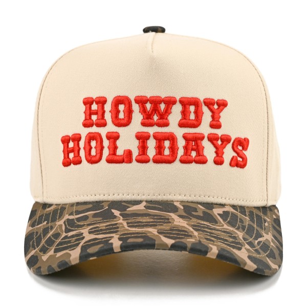 Saddle up for the season with this Howdy Holidays trucker cap, featuring bold embroidered lettering across a structured front panel with breathable mesh in the back. A playful western holiday look that pairs perfectly with cozy sweaters, flannels, and denim. The adjustable snapback closure delivers a comfortable fit for most head sizes, making it an easy gift and a festive seasonal favorite for boutiques and gift shops.