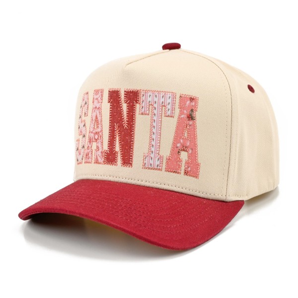 SANTA Baseball Cap with oversized candy stripe letters spelling out SANTA across the front for a bold, playful holiday look. A structured cap with a rich contrast brim that pairs perfectly with cream knits, puffer jackets, and denim. Ideal for Christmas parties, holiday shopping trips, and festive weekend outfits. Statement holiday caps are a trendy seasonal pick that boutique shoppers snap up for themselves and for gifting.