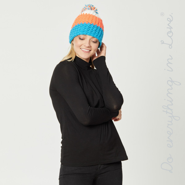 Do everything in Love brand color block knitted pom beanie.

- One size fits most adults
- 100% Acrylic