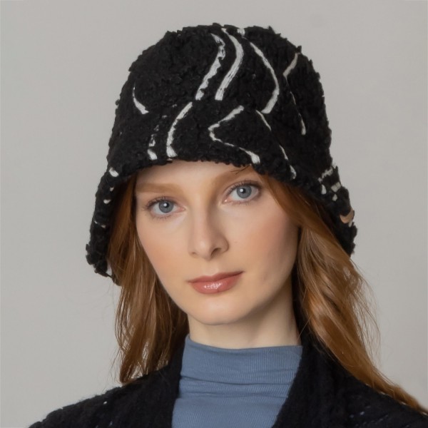 Fuzzy Tribal Striped Bucket Hat.

- Adjustable Draw String
- One Size Fits Most
- 100% Polyester