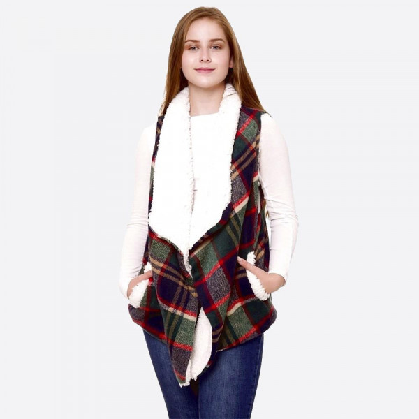 Tartan Plaid Sherpa Vest with Pockets.

- Pockets
- One size fits most 0-14
- Approximately 24" Long 
- 100% Polyester