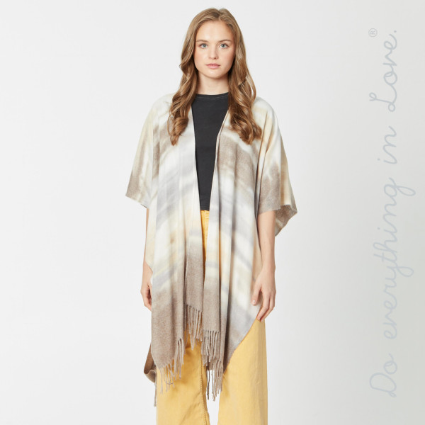 Do everything in Love Brand Ombre Tie-Dye Kimono with Fringe Tassels.

- One size fits most 0-14
- Approximately 37" L
- 100% Viscose