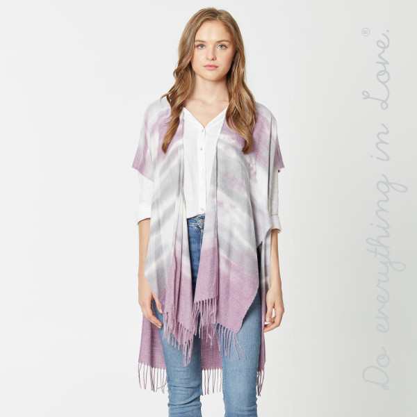 Do everything in Love Brand Ombre Tie-Dye Kimono with Fringe Tassels.

- One size fits most 0-14
- Approximately 37" L
- 100% Viscose