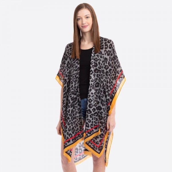 Women's Lightweight Leopard Print Bordered Kimono.

- One size fits most 0-14
- Approximately 37" L
- 100% Polyester